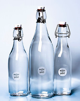 Elegant glass decanters and water serving bottles.